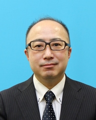 議長　松崎隆治議員の顔写真